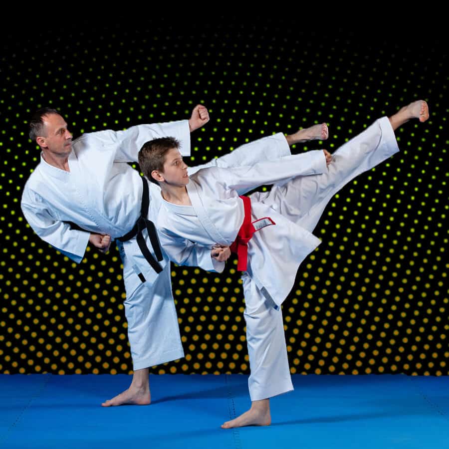 Martial Arts Lessons for Families in Katy TX - Dad and Son High Kick
