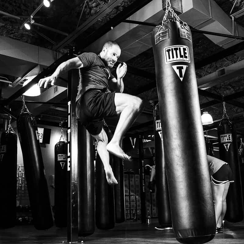 Mixed Martial Arts Lessons for Adults in Katy TX - Flying Knee Black and White MMA